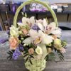 Плетеная корзинка с орхидеями , кустовыми розами и декоративной зеленью