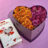 Коробочка в виде сердца с Рафаэлло, розовыми и оранжевыми розами